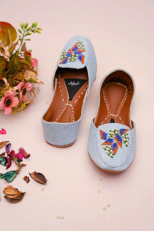  A sky blue loafer khussa with blue, orange, and green cut dana beads online