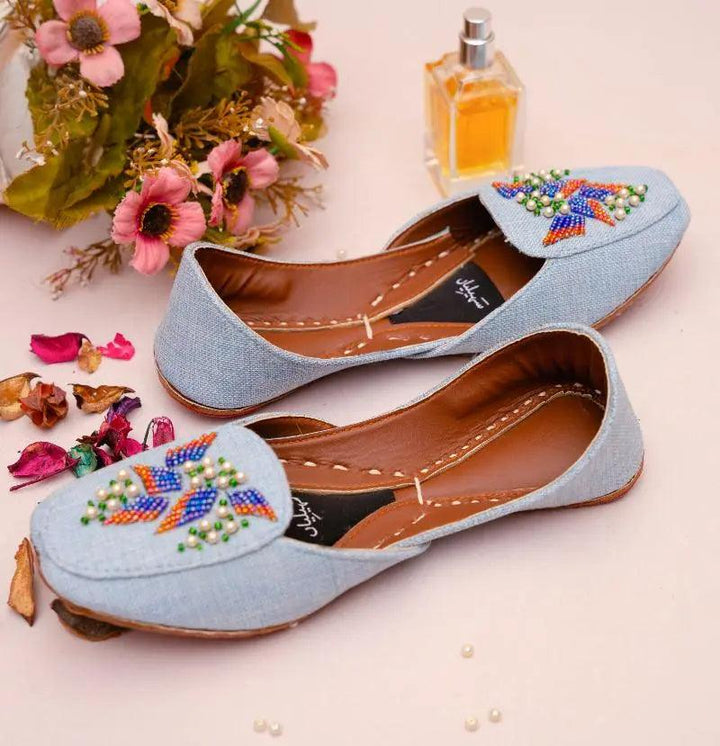  A sky blue loafer khussa with blue, orange, and green cut dana beads online